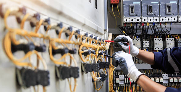 Professional Electrician technician working in Fyffe, AL